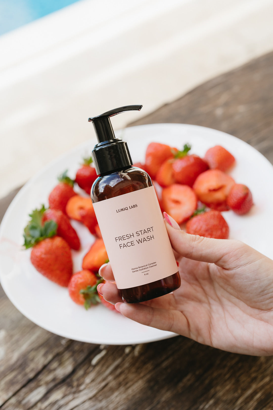 Buttermilk face wash lifestyle moment with cream linen and golden light