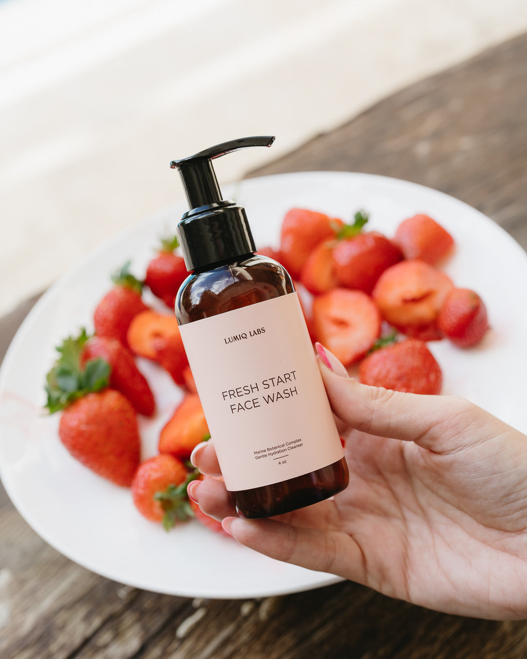 Buttermilk face wash lifestyle moment with cream linen and golden light