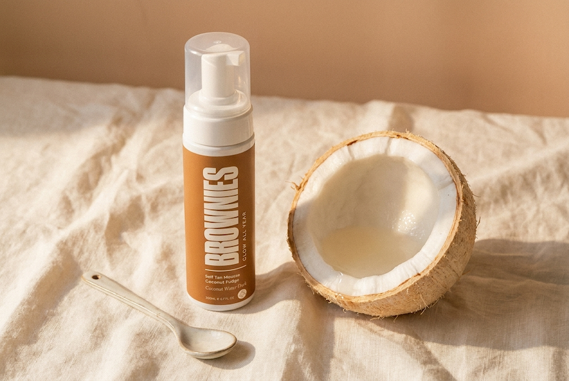 Fresh coconut beside the Brownies Coconut Fudge mousse